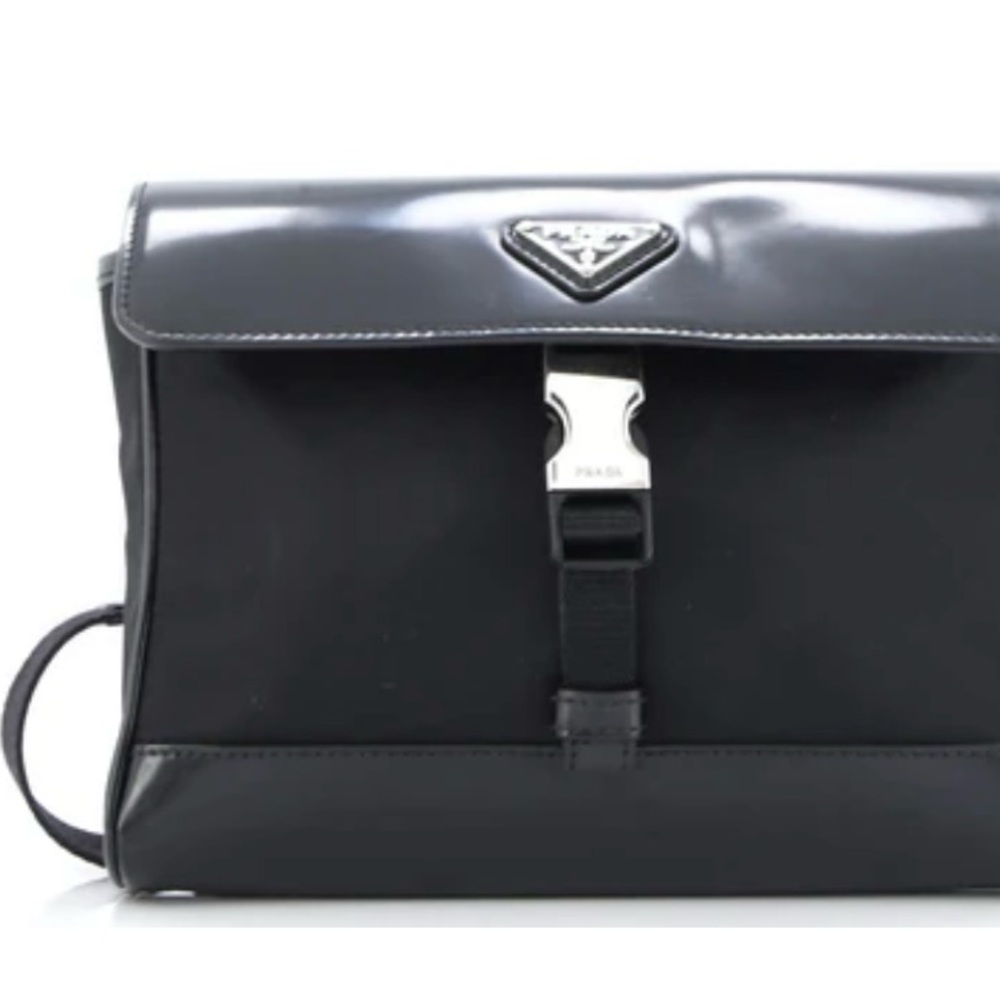 Prada  black leather cross body/waist bag. NWT certificate of authenticity.